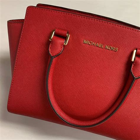 damaged michael kors purse|does michael kors repair handbags.